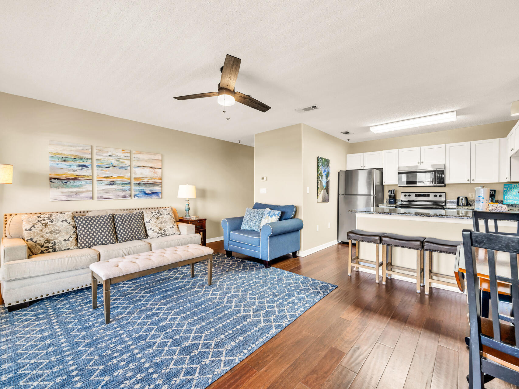 144 Spires Lane, Unit 410 Santa Rosa Beach, FL 32459 - Photo 18 of 33 a living room with furniture and kitchen view