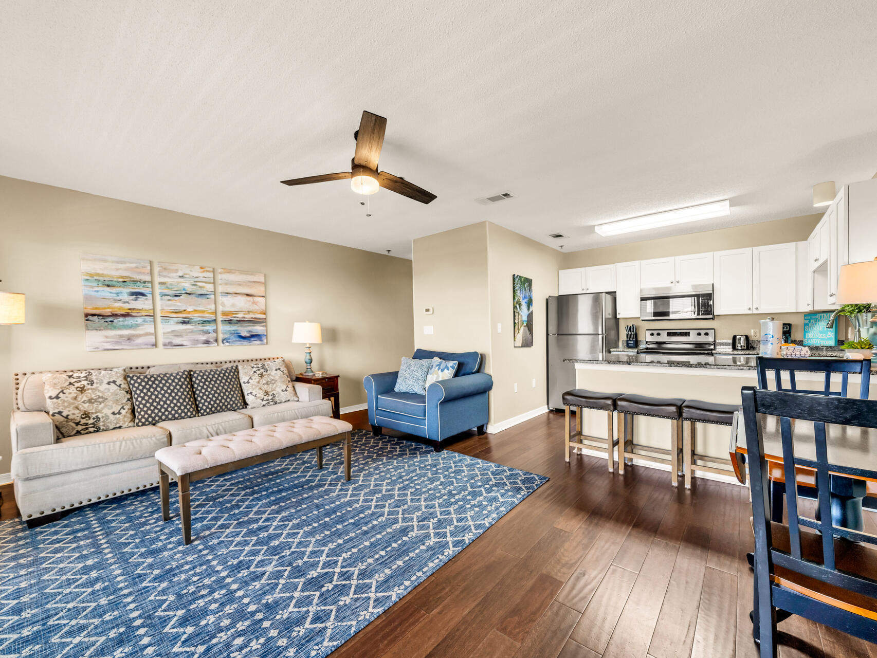 144 Spires Lane, Unit 410 Santa Rosa Beach, FL 32459 - Photo 19 of 33 a living room with furniture and a wooden floor