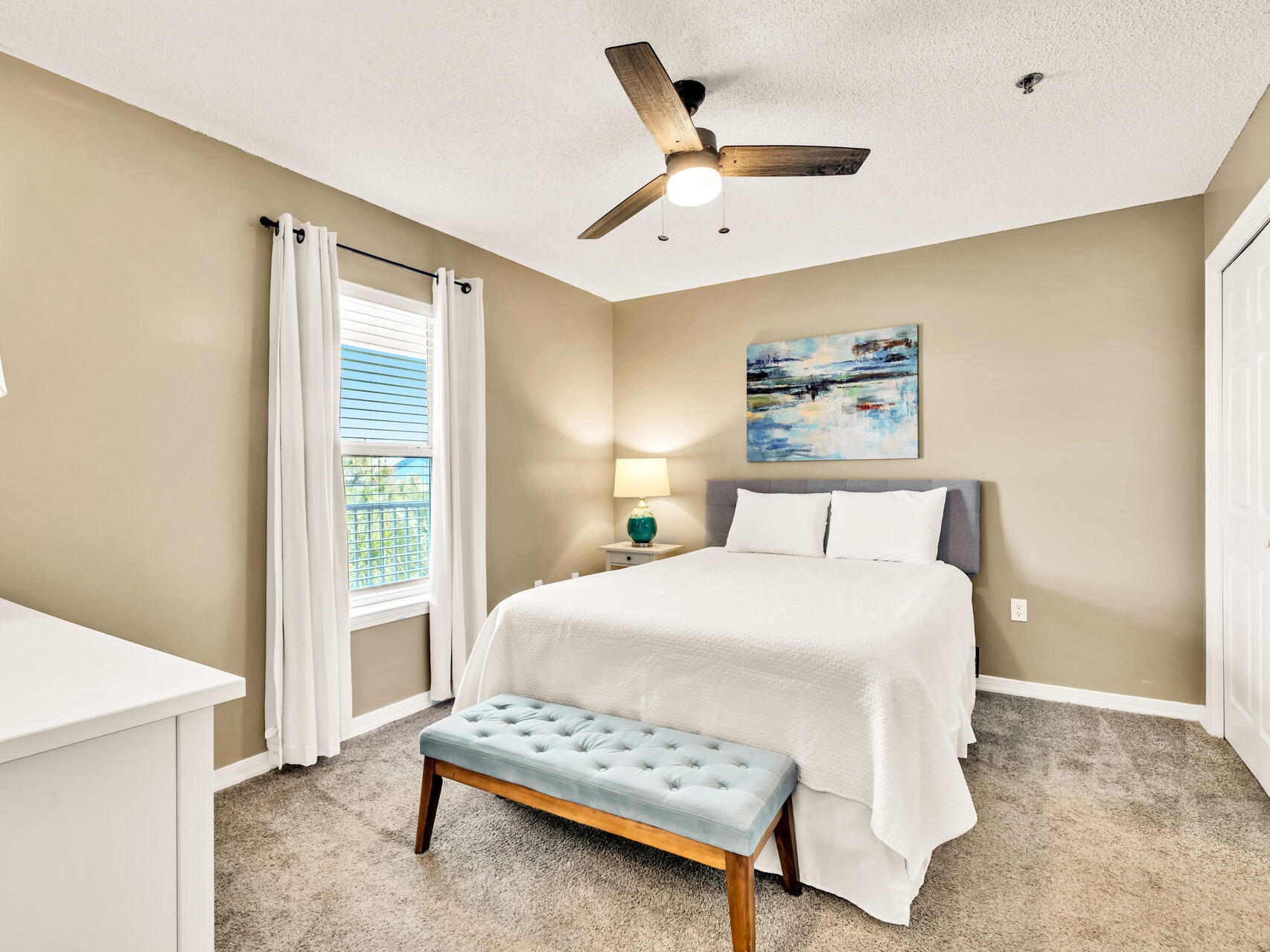 144 Spires Lane, Unit 410 Santa Rosa Beach, FL 32459 - Photo 2 of 33 a bedroom with a bed and a window