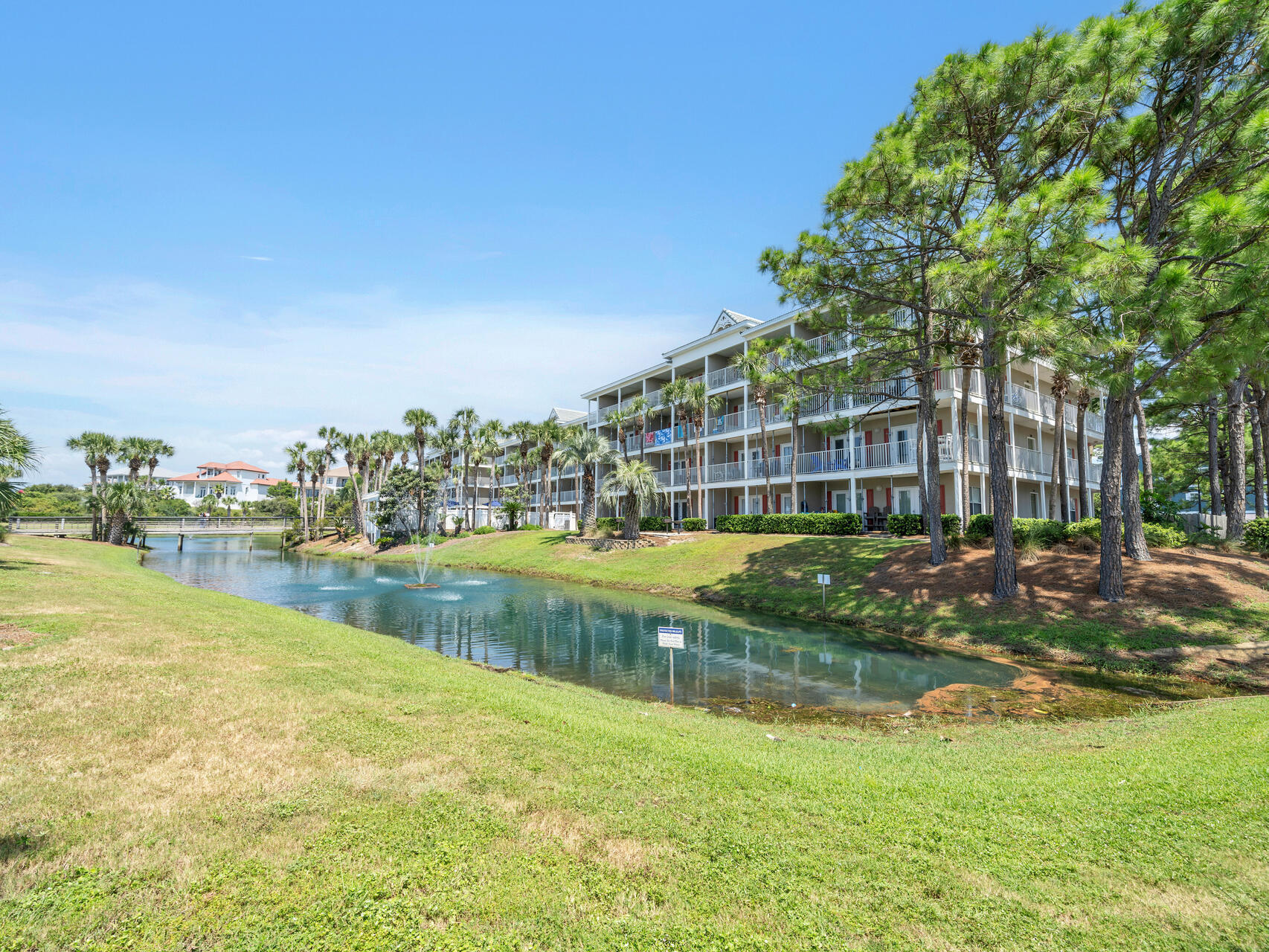 144 Spires Lane, Unit 410 Santa Rosa Beach, FL 32459 - Photo 33 of 33 a view of swimming pool with outdoor seating and garden