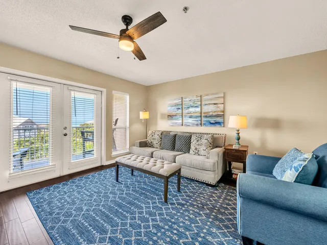a living room with furniture and a window