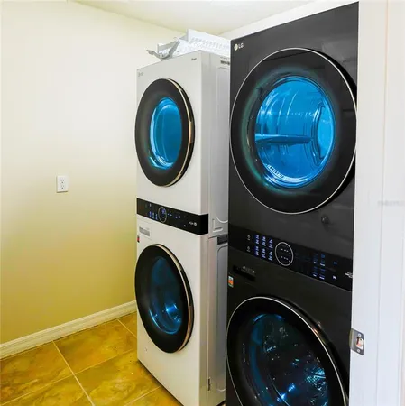 a view of a storage & utility room with a washer and dryer
