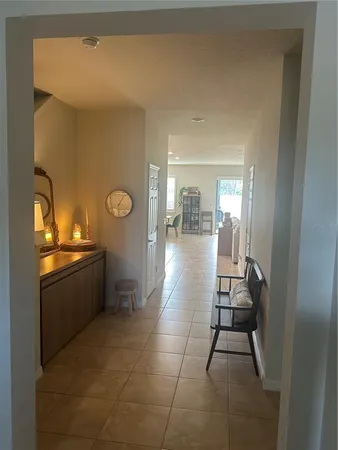 a lobby with furniture and rug