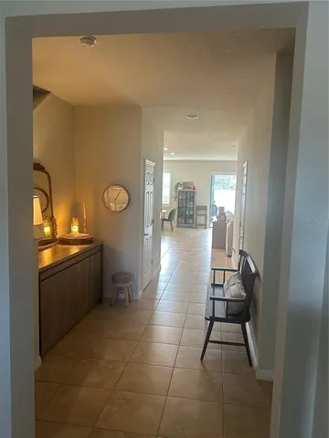 a lobby with furniture and rug