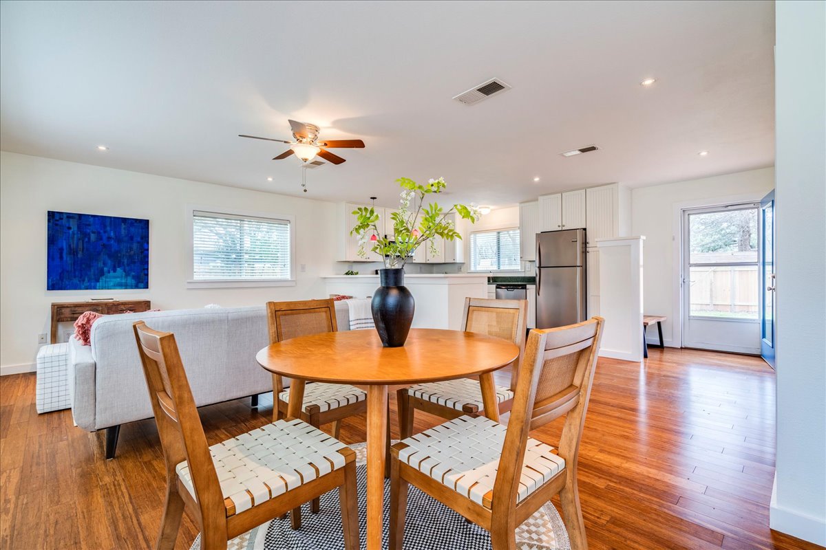 2505 Riddle Road Austin, TX 78748 - Photo 3 of 8 a dining room with furniture and wooden floor