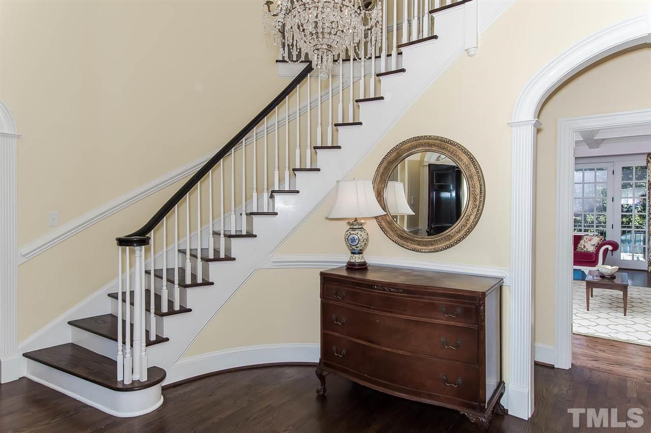 2342 Churchill Road Raleigh, NC 27608 - Photo 3 of 25 a view of entryway and hall with wooden floor