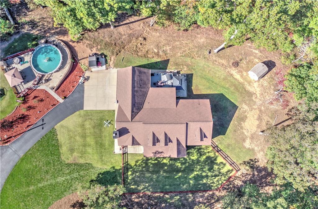 304 Garland Way Canton, GA 30115 - Photo 137 of 138 an aerial view of a house with garden space and street view