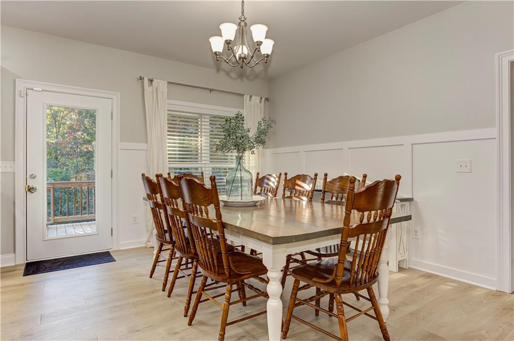 304 Garland Way Canton, GA 30115 - Photo 40 of 138 a view of a dining room with furniture window and outside view