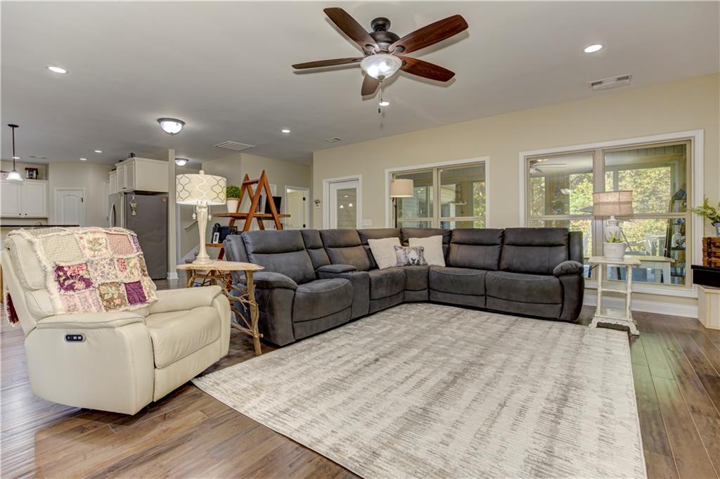 304 Garland Way Canton, GA 30115 - Photo 83 of 138 a living room with furniture and a large window