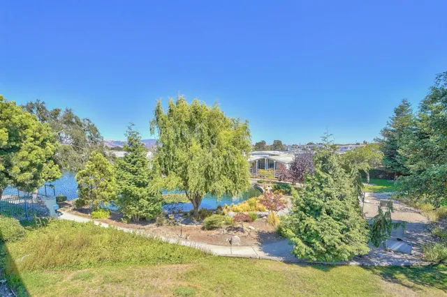 a view of a lake from a balcony