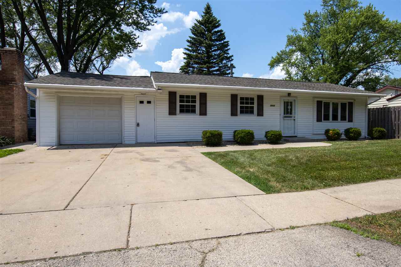 7712 Randy Road Machesney Park, IL 61115 - Photo 1 of 25 a front view of house with yard