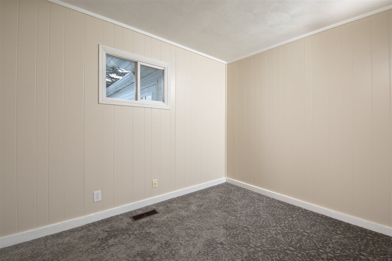 7712 Randy Road Machesney Park, IL 61115 - Photo 14 of 25 an empty room with a empty space and window