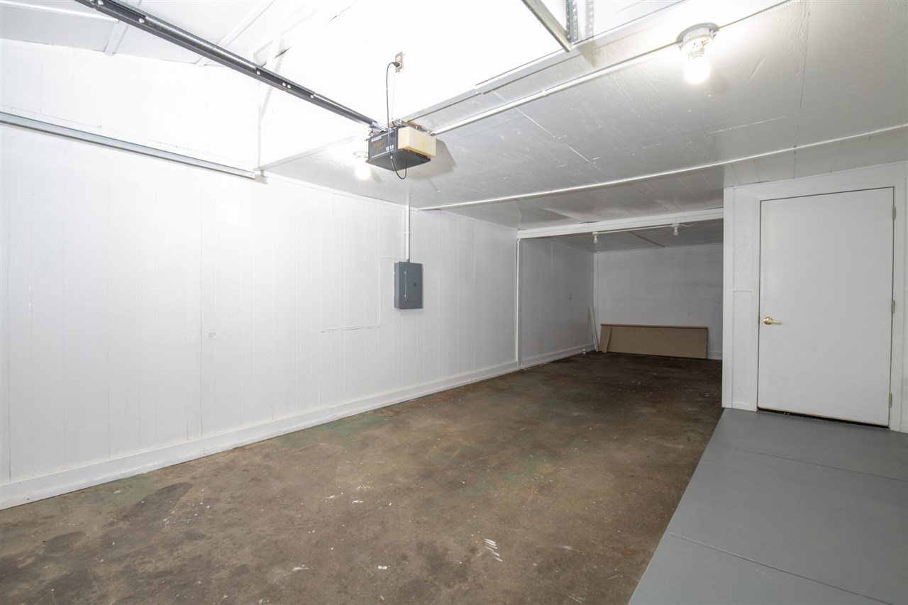 7712 Randy Road Machesney Park, IL 61115 - Photo 18 of 25 an empty room with a ceiling fan and a window