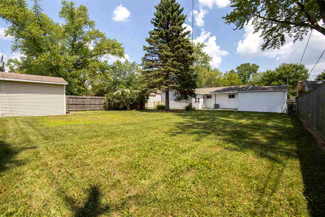 7712 Randy Road Machesney Park, IL 61115 - Photo 23 of 25 a view of a large tree with a yard