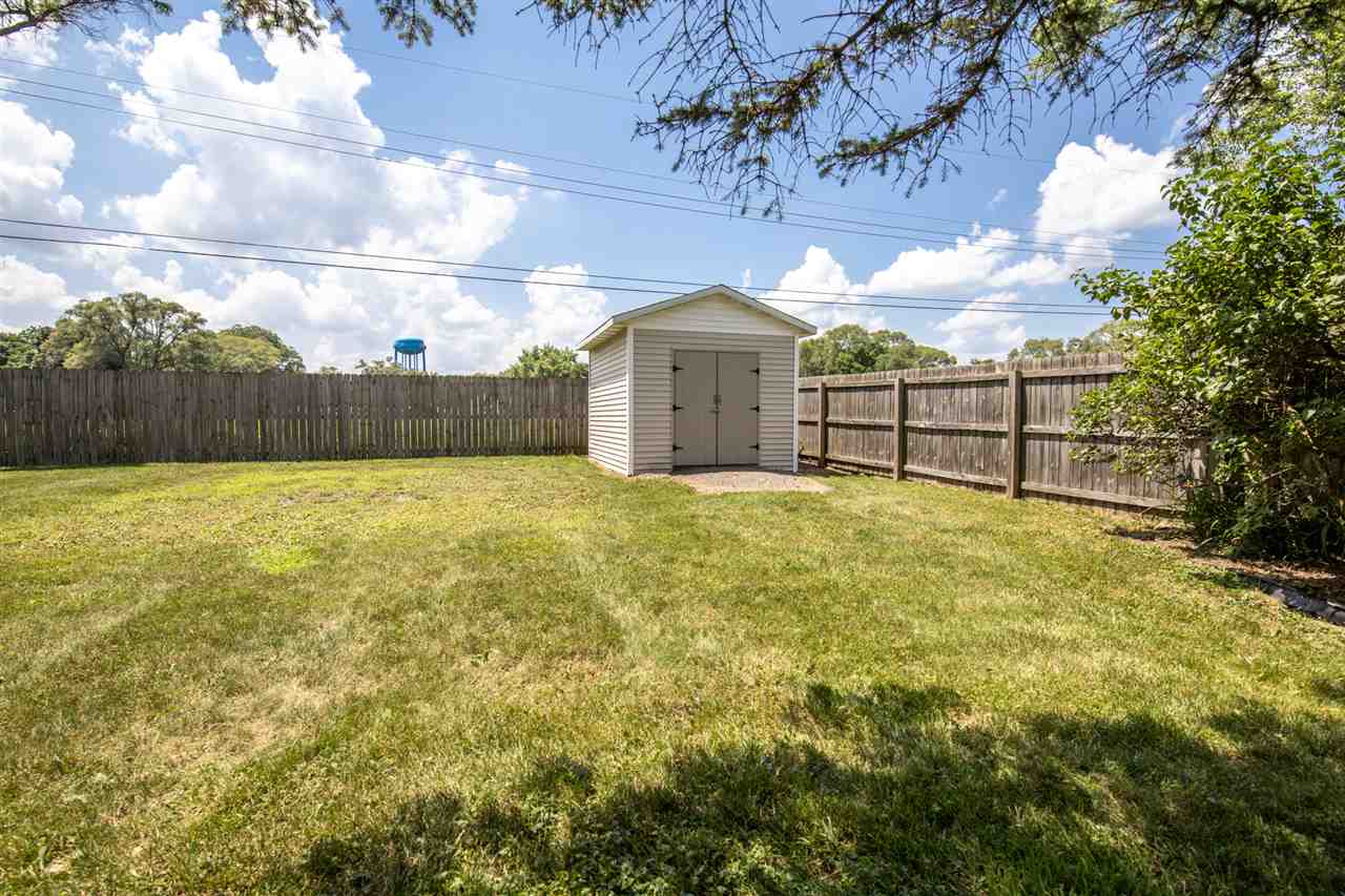 7712 Randy Road Machesney Park, IL 61115 - Photo 24 of 25 a view of a large pool with a small yard
