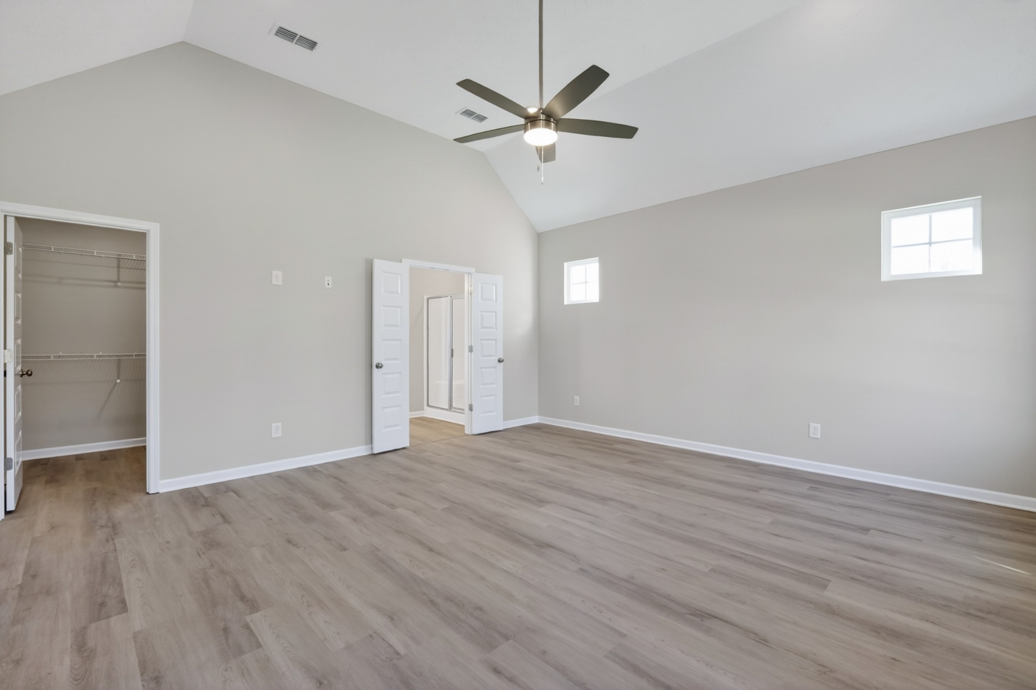 346 North Fork Branch Road Tullahoma, TN 37388 - Photo 25 of 37 a view of an empty room with wooden floor and a ceiling fan