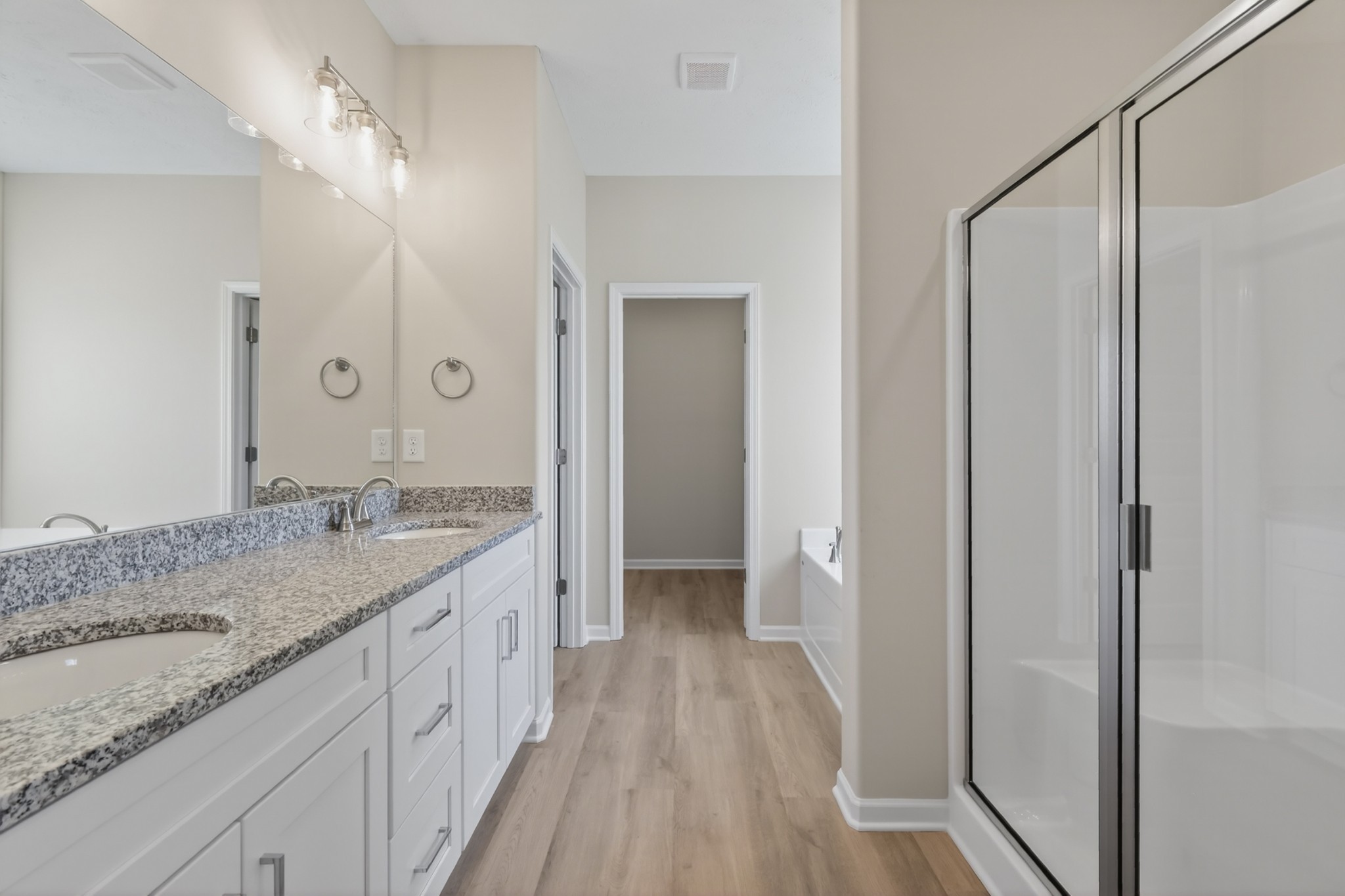 346 North Fork Branch Road Tullahoma, TN 37388 - Photo 27 of 37 a bathroom with a granite countertop sink a mirror and a shower