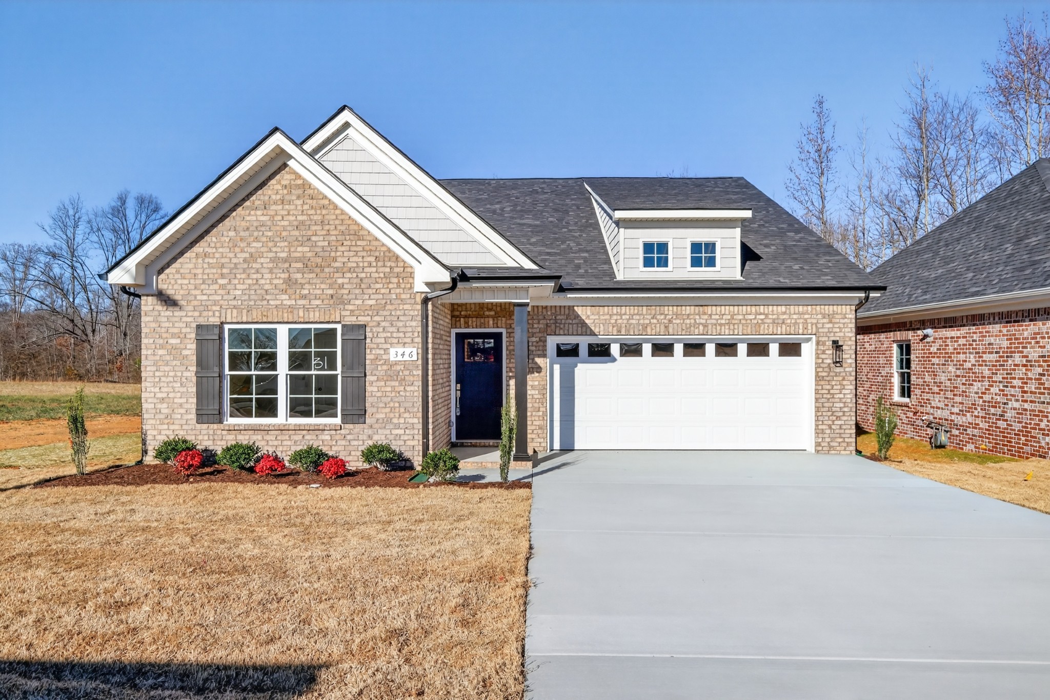 346 North Fork Branch Road Tullahoma, TN 37388 - Photo 3 of 37 a front view of a house with a yard and garage
