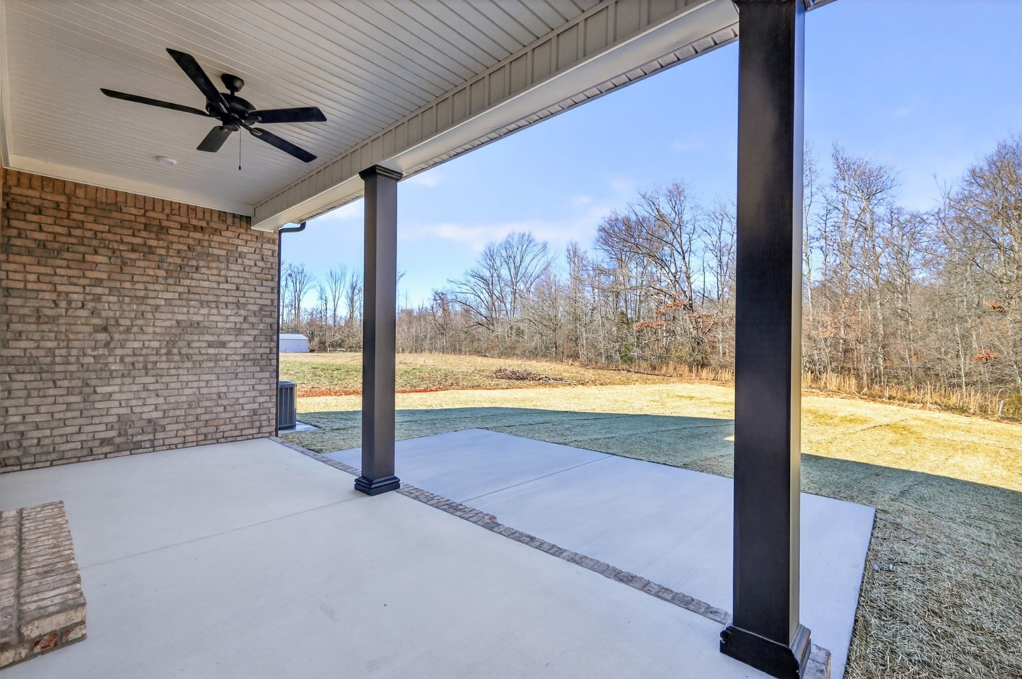 346 North Fork Branch Road Tullahoma, TN 37388 - Photo 33 of 37 a view of a porch with a floor to ceiling window next to a yard