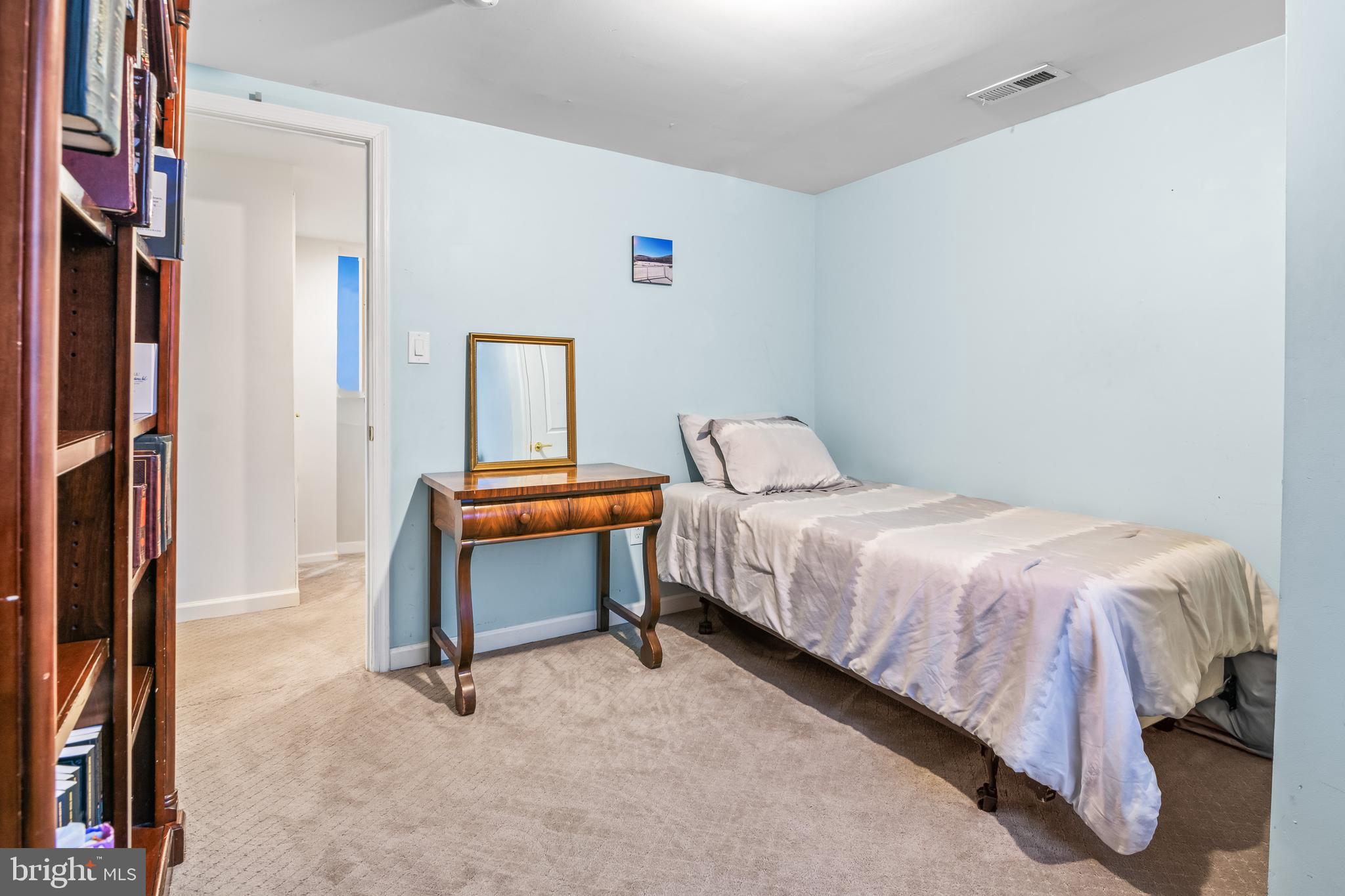 6308 Ivymount Road Baltimore, MD 21209 - Photo 19 of 22 a bedroom with a bed and a window