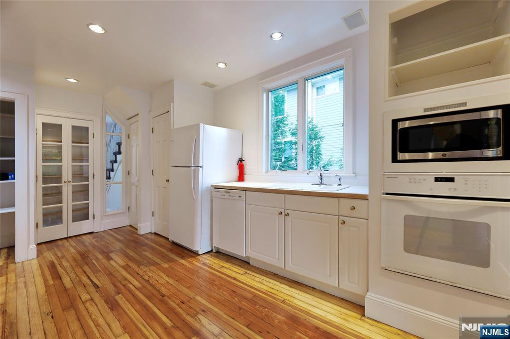 24 Merrifield Way Cresskill, NJ 07626 - Photo 14 of 27 a view of a livingroom with an empty space and a window