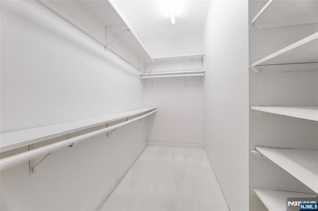 24 Merrifield Way Cresskill, NJ 07626 - Photo 21 of 27 a view of an empty walk in closet
