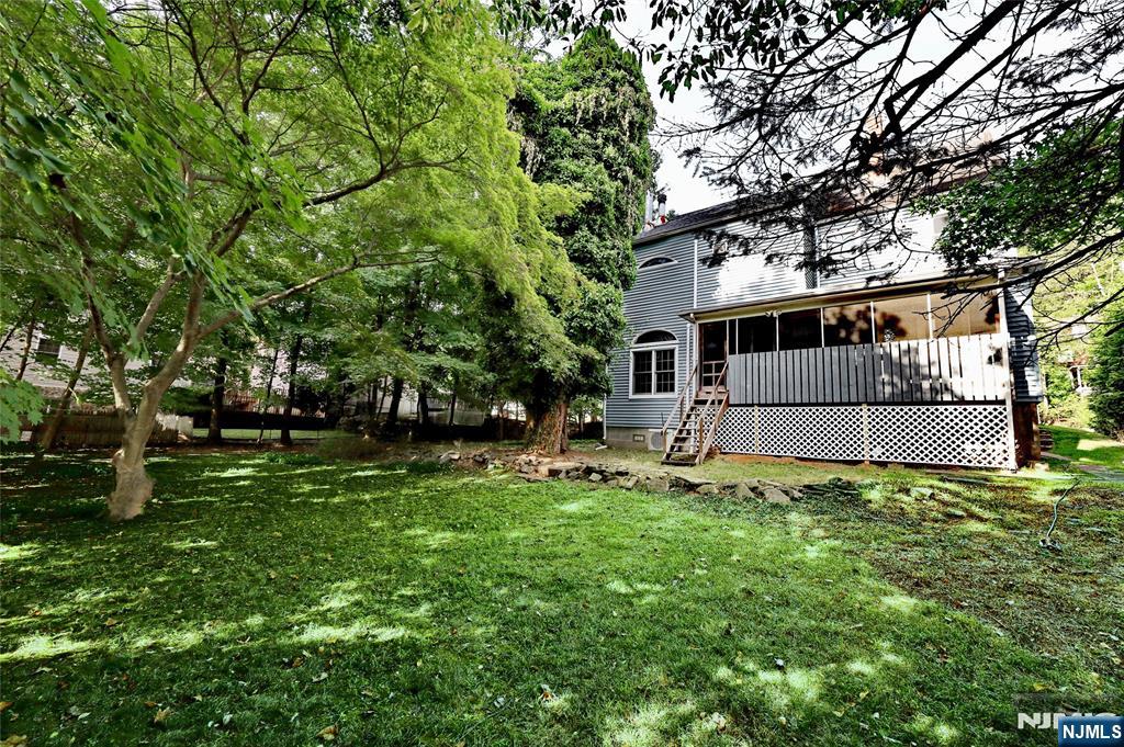 24 Merrifield Way Cresskill, NJ 07626 - Photo 27 of 27 a view of a house with backyard and sitting area