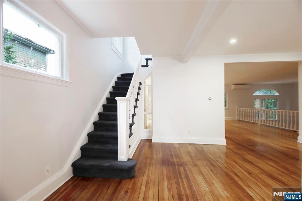 24 Merrifield Way Cresskill, NJ 07626 - Photo 5 of 27 a view of entryway with wooden floor