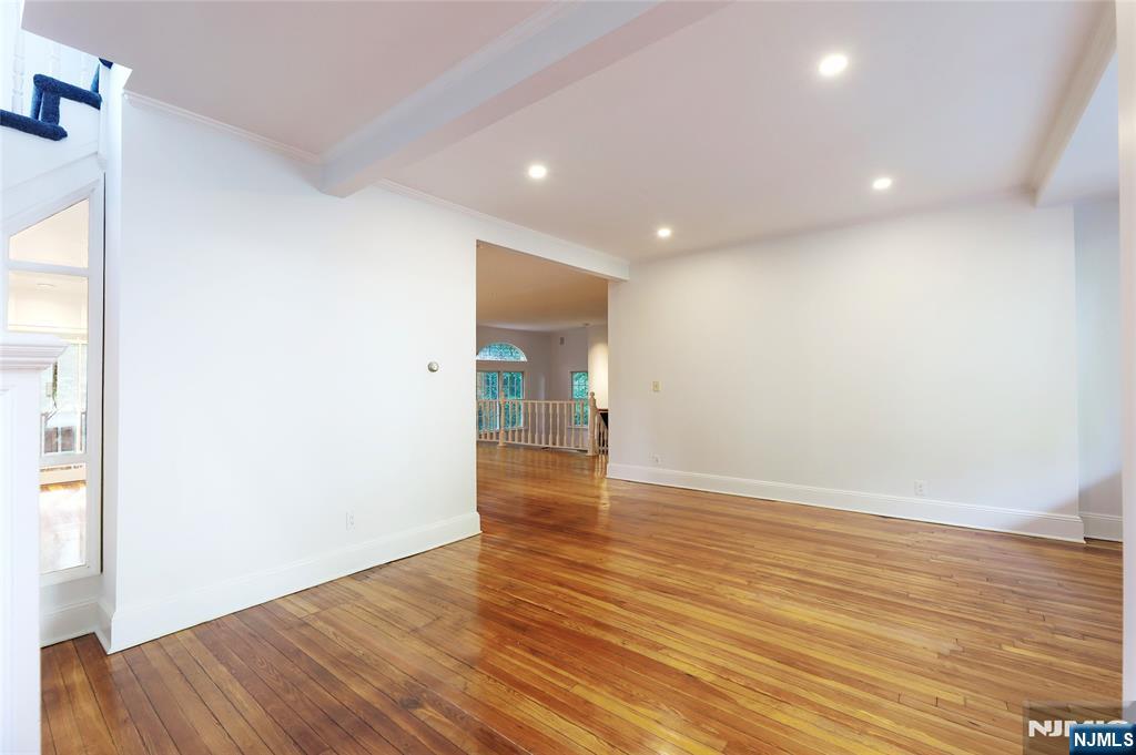 24 Merrifield Way Cresskill, NJ 07626 - Photo 7 of 27 a view of empty room with wooden floor