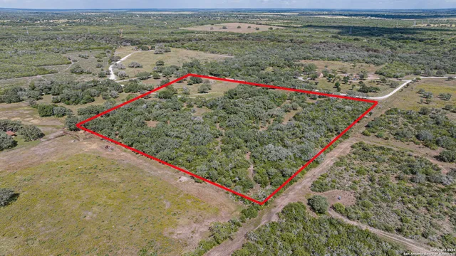 a view of backyard with green space