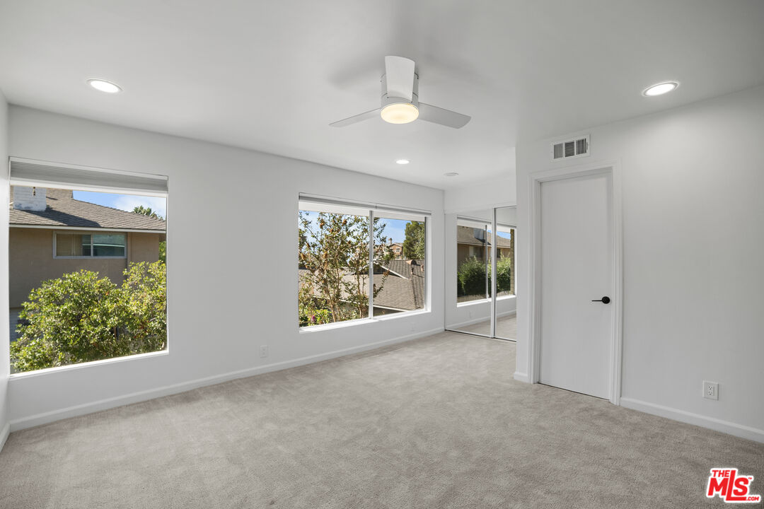 963 Glencliff Street La Habra, CA 90631 - Photo 16 of 31 an empty room with windows and closet
