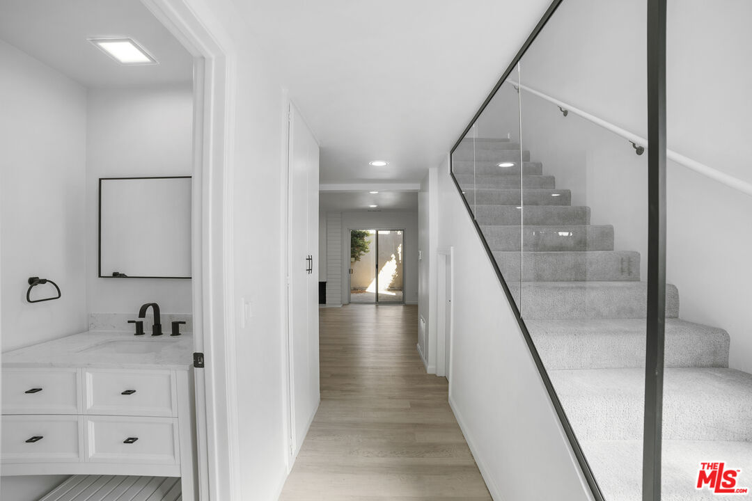 963 Glencliff Street La Habra, CA 90631 - Photo 4 of 31 a view of a hallway with mirror