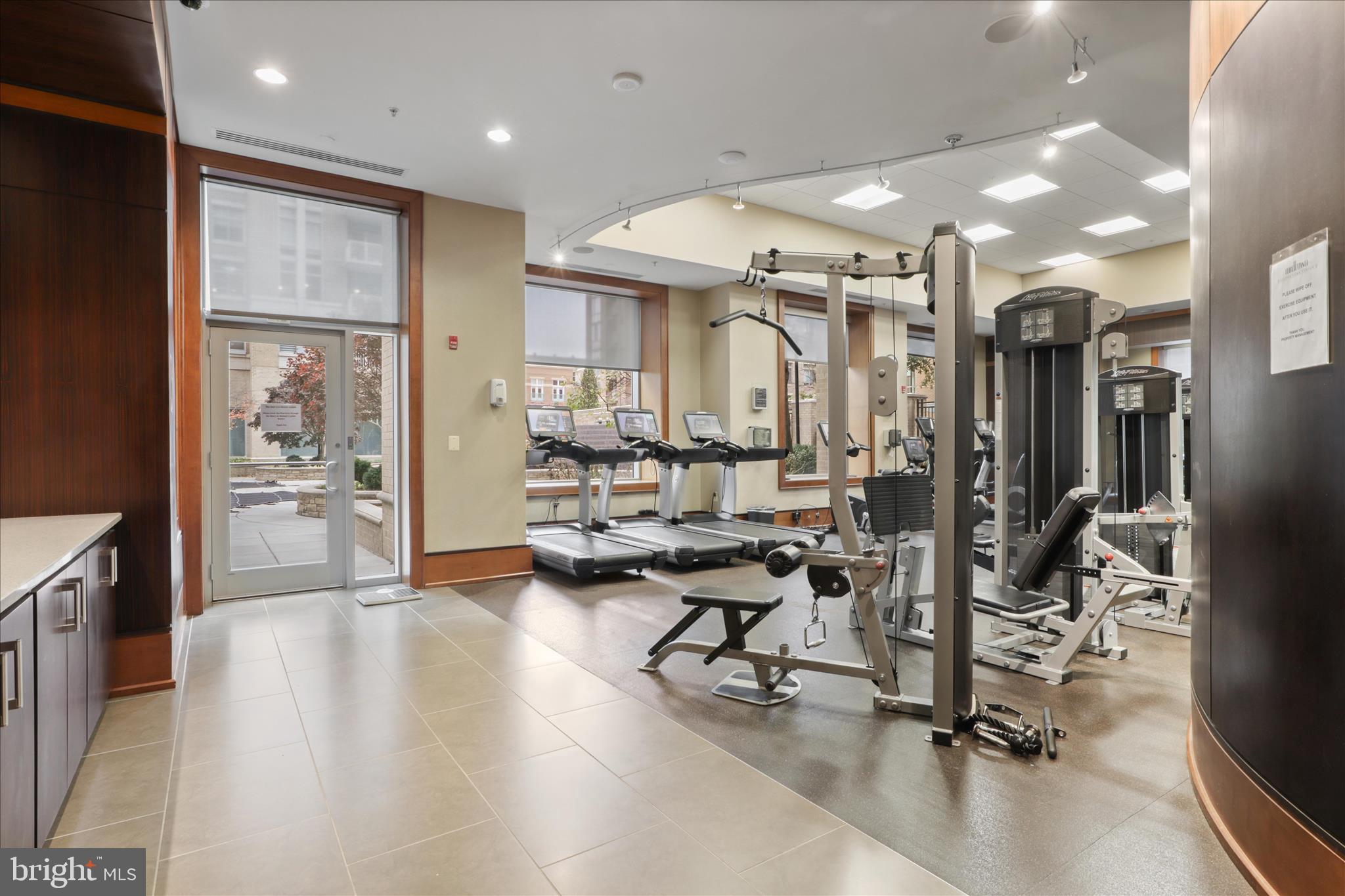 11990 Market Street, Unit 216 Reston, VA 20190 - Photo 14 of 41 a view of a room with gym equipment