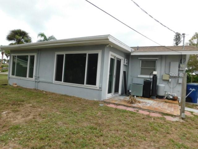 4721 Pompano Road Venice, FL 34293 - Photo 12 of 13 a view of a house with a patio