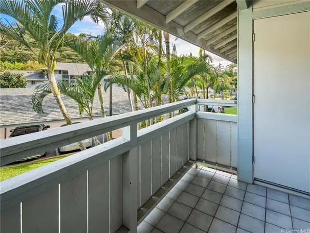 a view of a balcony with an outdoor space