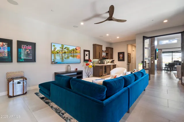 a spacious bathroom with a sink double vanity and a mirror