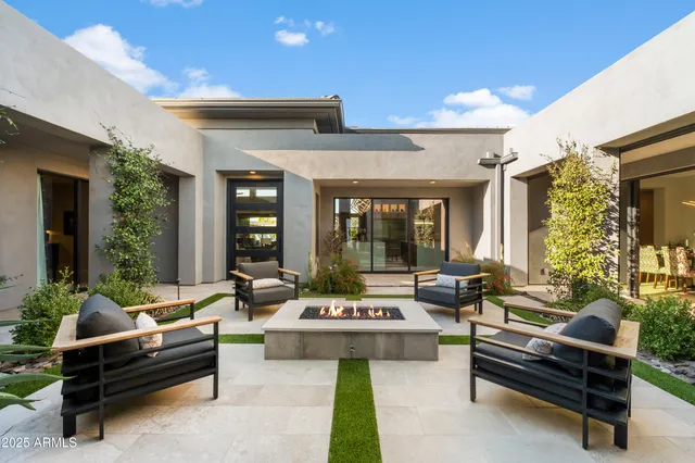 a large kitchen with stainless steel appliances lots of counter top space