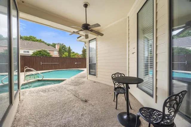 a view of a room with a floor to ceiling window