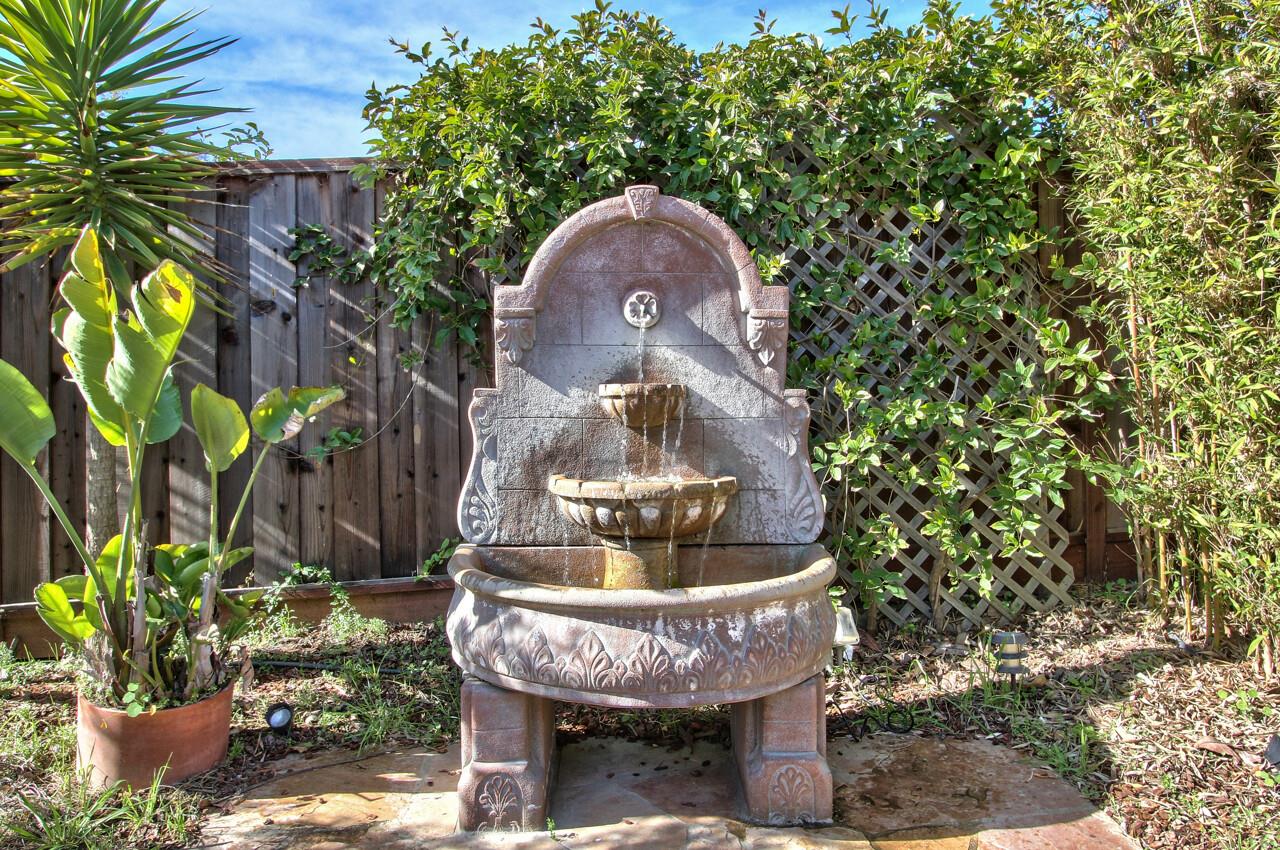 545 Pini Road Watsonville, CA 95076 - Photo 12 of 18 a front view of a house with a yard garage and sitting area