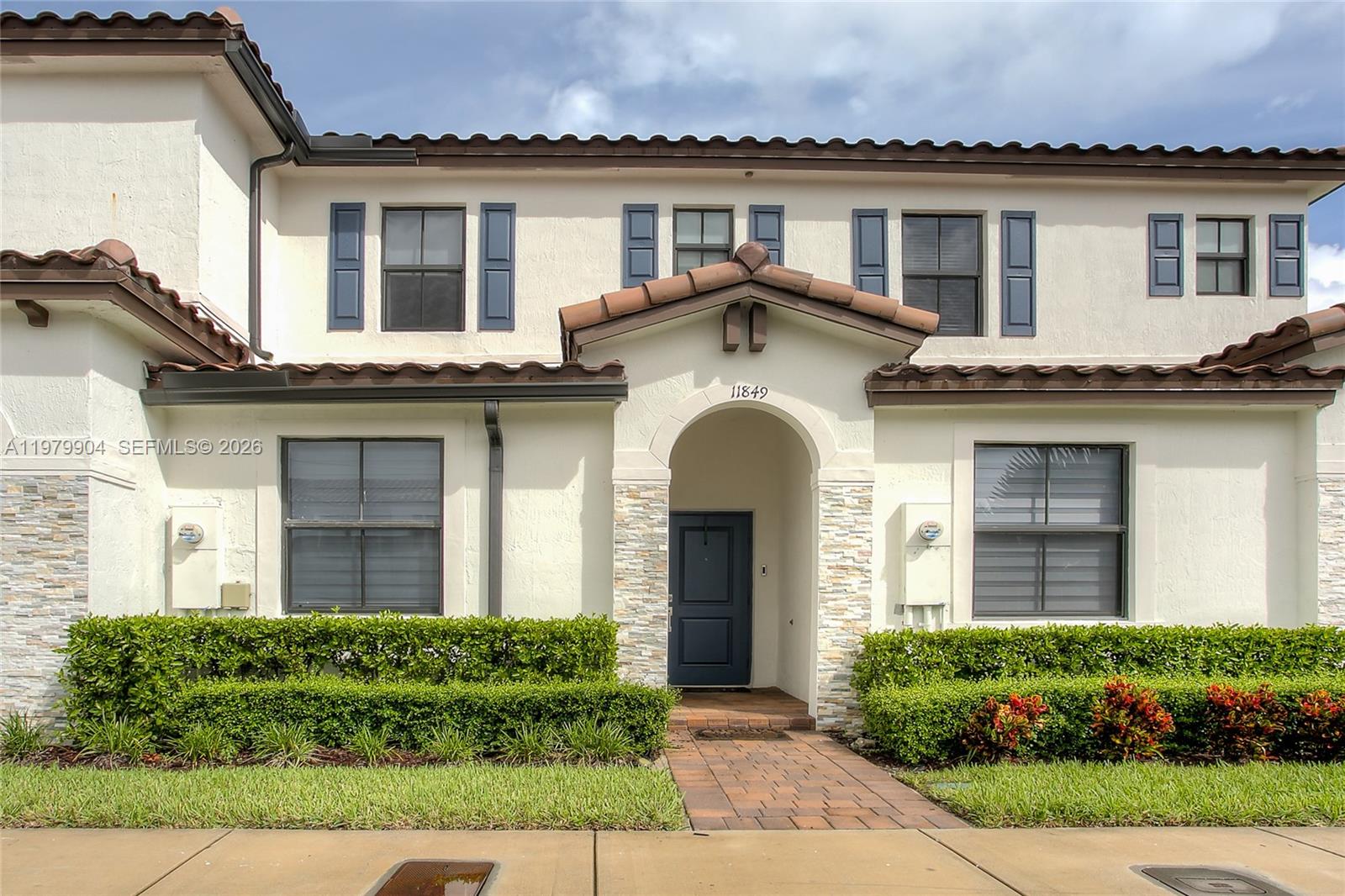 11849 Southwest 247th Terrace Homestead, FL 33032 - Photo 2 of 13 front view of a house