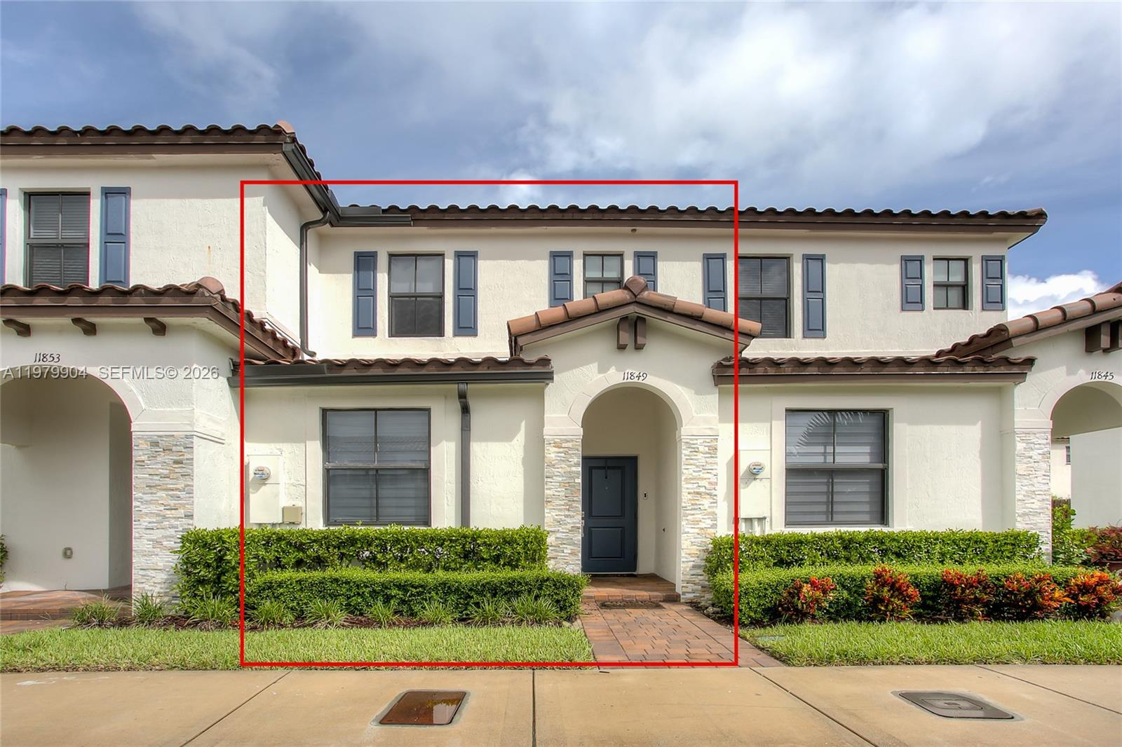 11849 Southwest 247th Terrace Homestead, FL 33032 - Photo 3 of 13 front view of a house with a yard