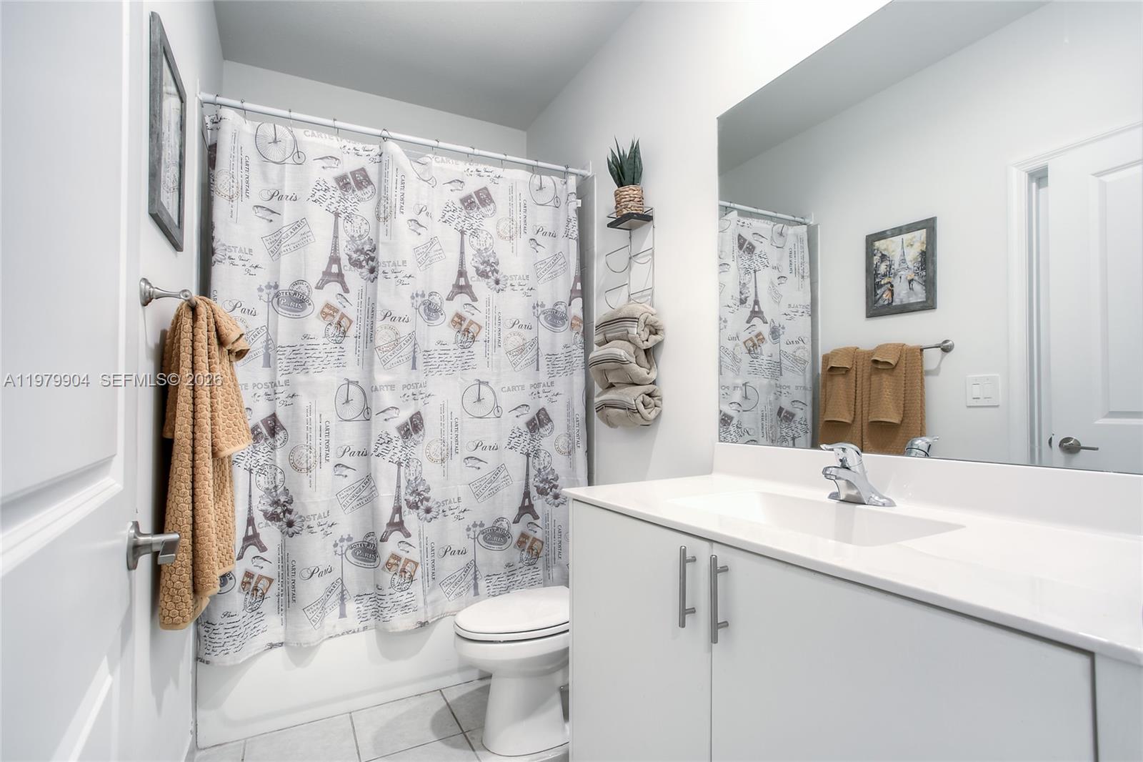 11849 Southwest 247th Terrace Homestead, FL 33032 - Photo 7 of 13 a bathroom with a sink toilet a mirror and shower