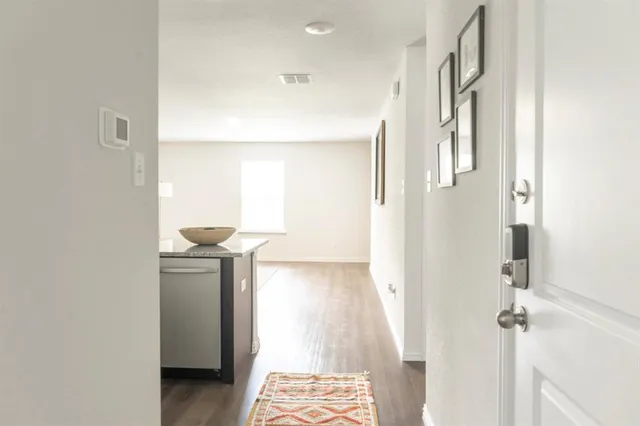 a kitchen with a stove and a microwave