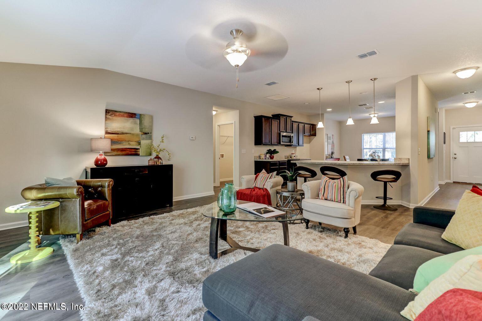 8551 Hilma Road Jacksonville, FL 32244 - Photo 19 of 30 living room view to kitchen