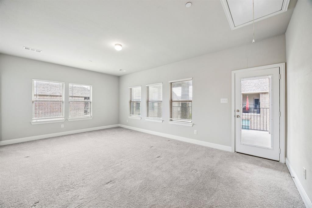 8081 Snowmass Drive Frisco, TX 75034 - Photo 19 of 25 an empty room with windows