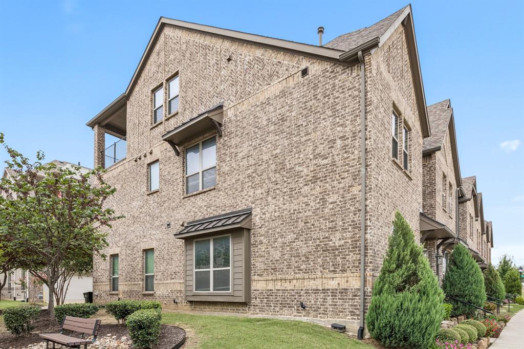 8081 Snowmass Drive Frisco, TX 75034 - Photo 25 of 25 front view of a building with a garden