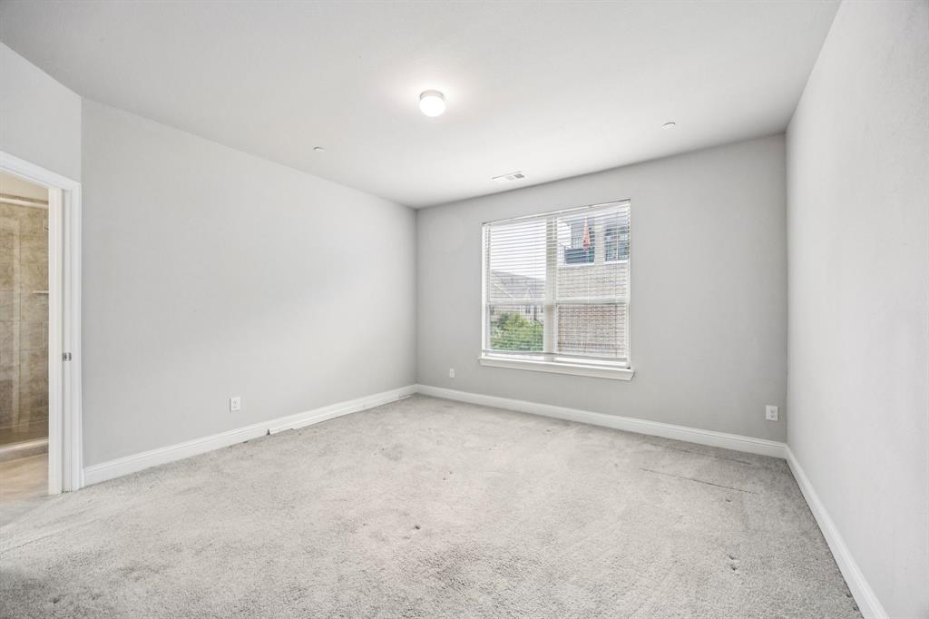 8081 Snowmass Drive Frisco, TX 75034 - Photo 10 of 25 an empty room with windows