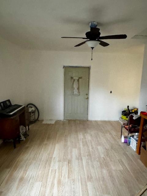 142 Camellia Way Modesto, CA 95354 - Photo 7 of 8 a bedroom with a bed and a chandelier