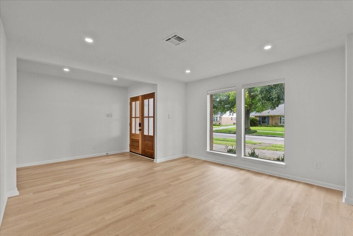 5762 Birdwood Road Houston, TX 77096 - Photo 4 of 49 THIS VERSATILE ROOM CAN BE FORMAL LIVING OR SITTING AREA, OR EVEN A DEN.