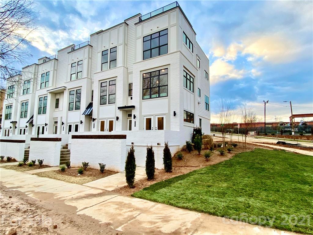 2335 Wesley Village Road, Unit 35 Charlotte, NC 28208 - Photo 1 of 28 a view of a building with a yard
